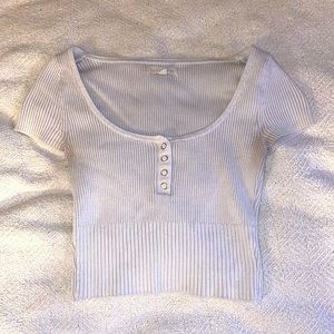 White ribbed short sleeve top, cropped.